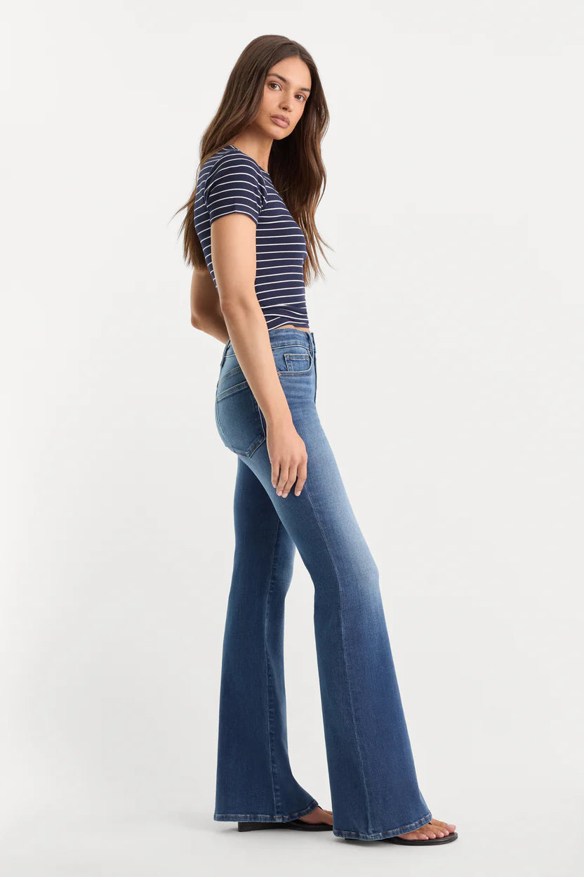 good american good legs soft tech flare jeans mid-rise with navy and white stripe tee black flip flops indigo133 dark wash