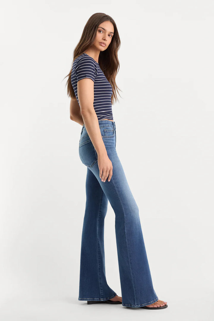 good american good legs soft tech flare jeans mid-rise with navy and white stripe tee black flip flops indigo133 dark wash