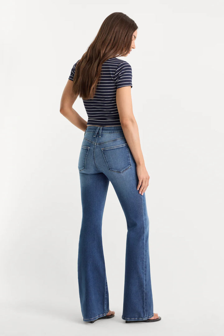 good american good legs soft tech flare jeans mid-rise with navy and white stripe tee black flip flops indigo133 dark wash
