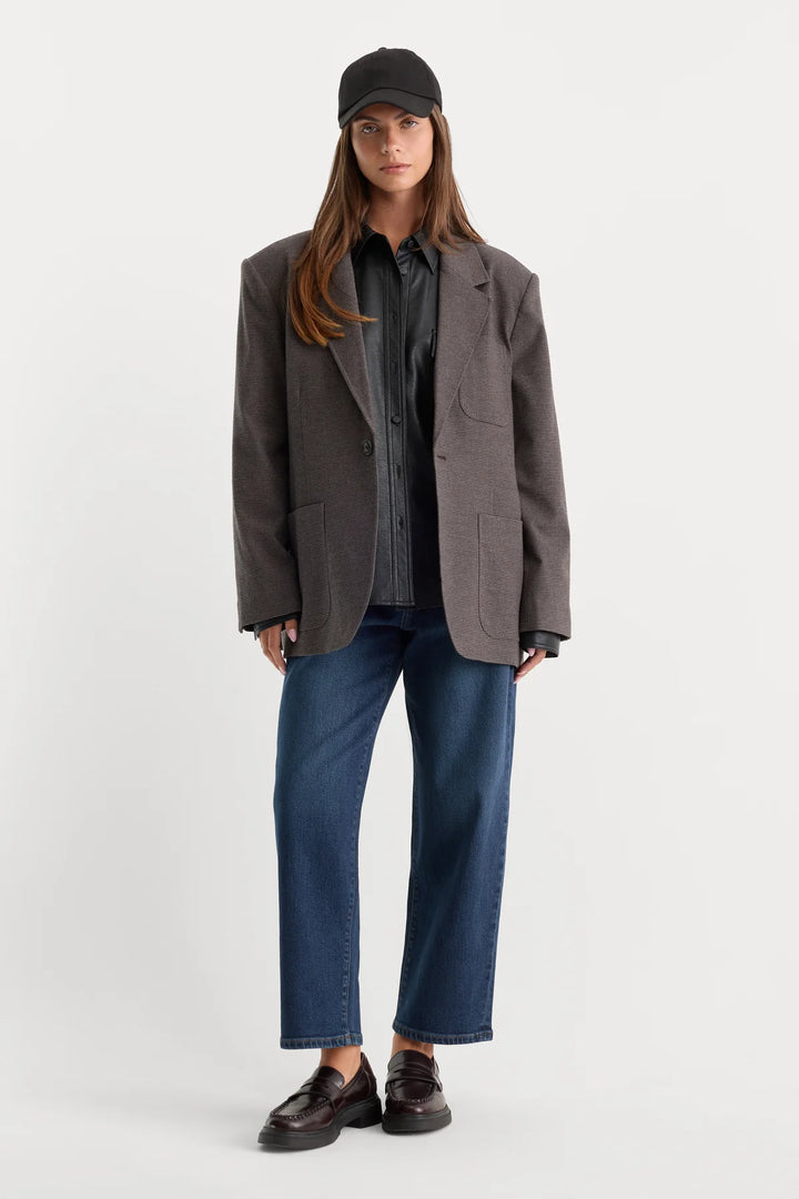 good American Vintage Barrel jeans dark wash with an oversized dark gray taupe blazer and brown loafers