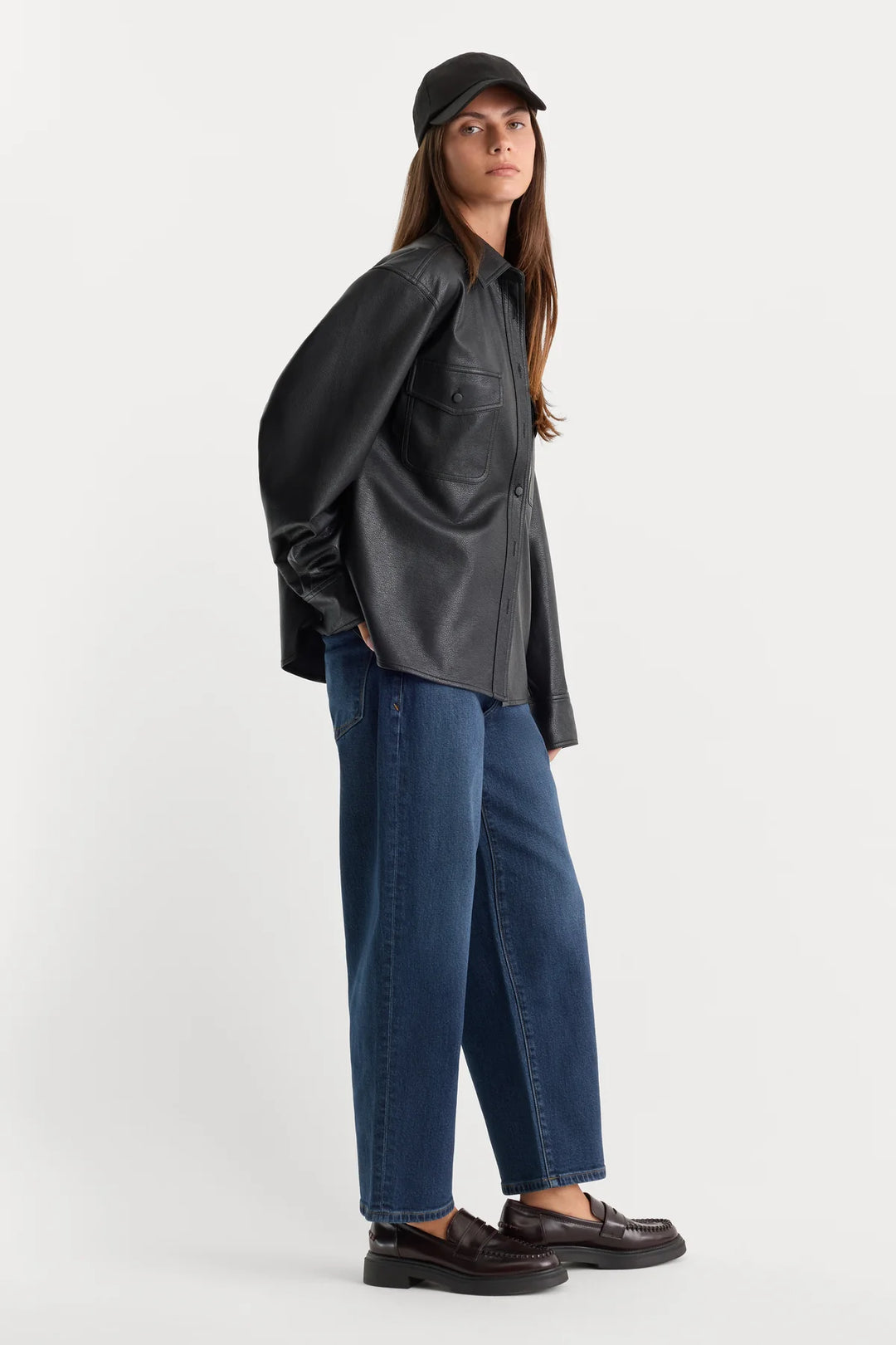 good American Vintage Barrel jeans dark wash with an oversized dark gray taupe blazer and brown loafers