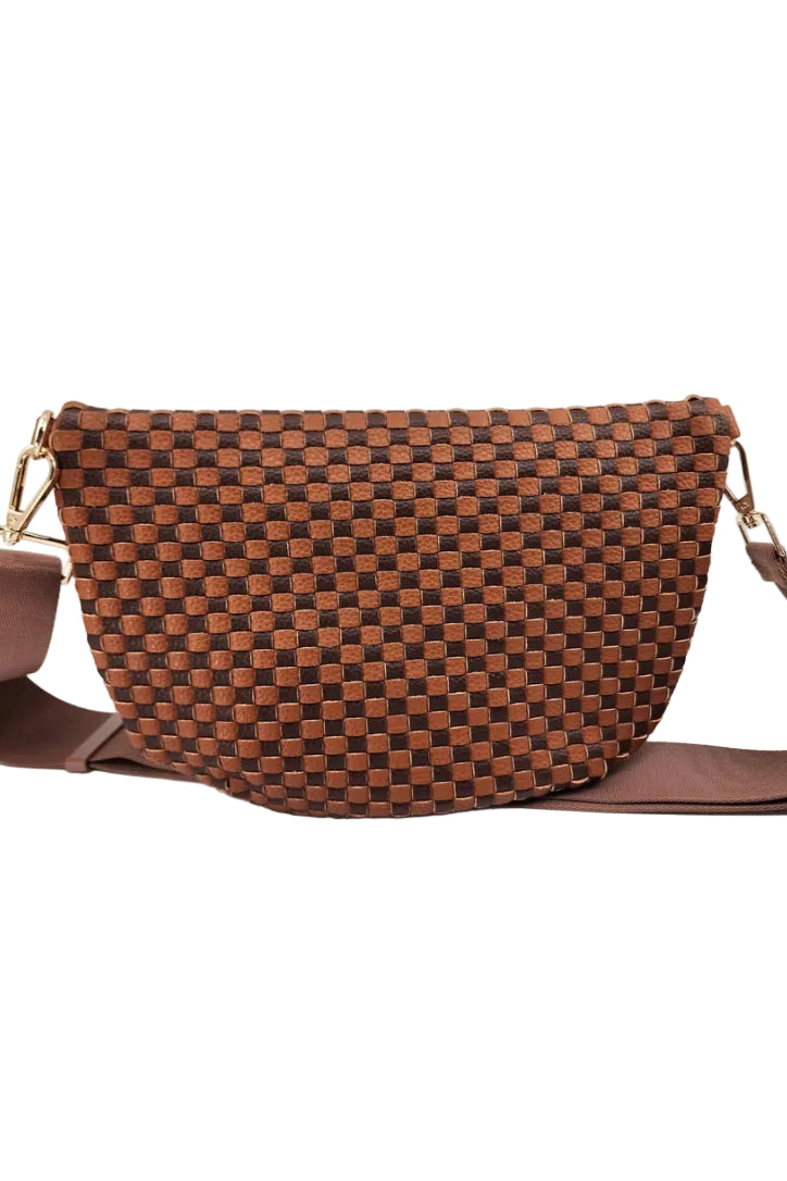 A brown woven leather crescent-shaped shoulder bag with a matching brown strap and gold-tone hardware, shown against a plain white background.