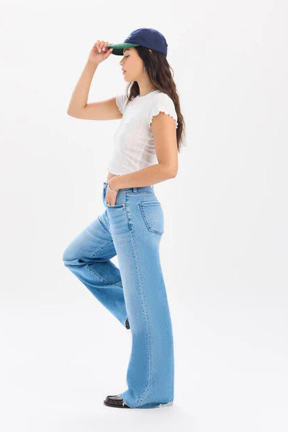 daze denim far out high rise wide leg jeans with cream color crop top and loafers