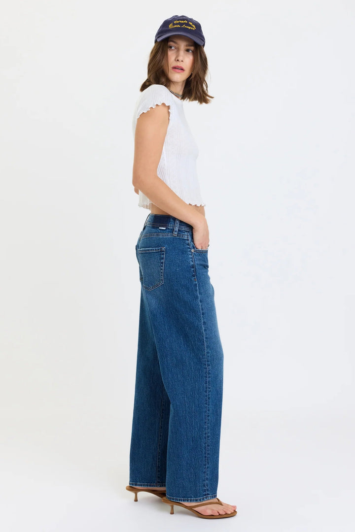 daze denim replay low rise v-waist barrel jeans in a medium wash with a white pointelle lettuce trim short sleeve t-shirt