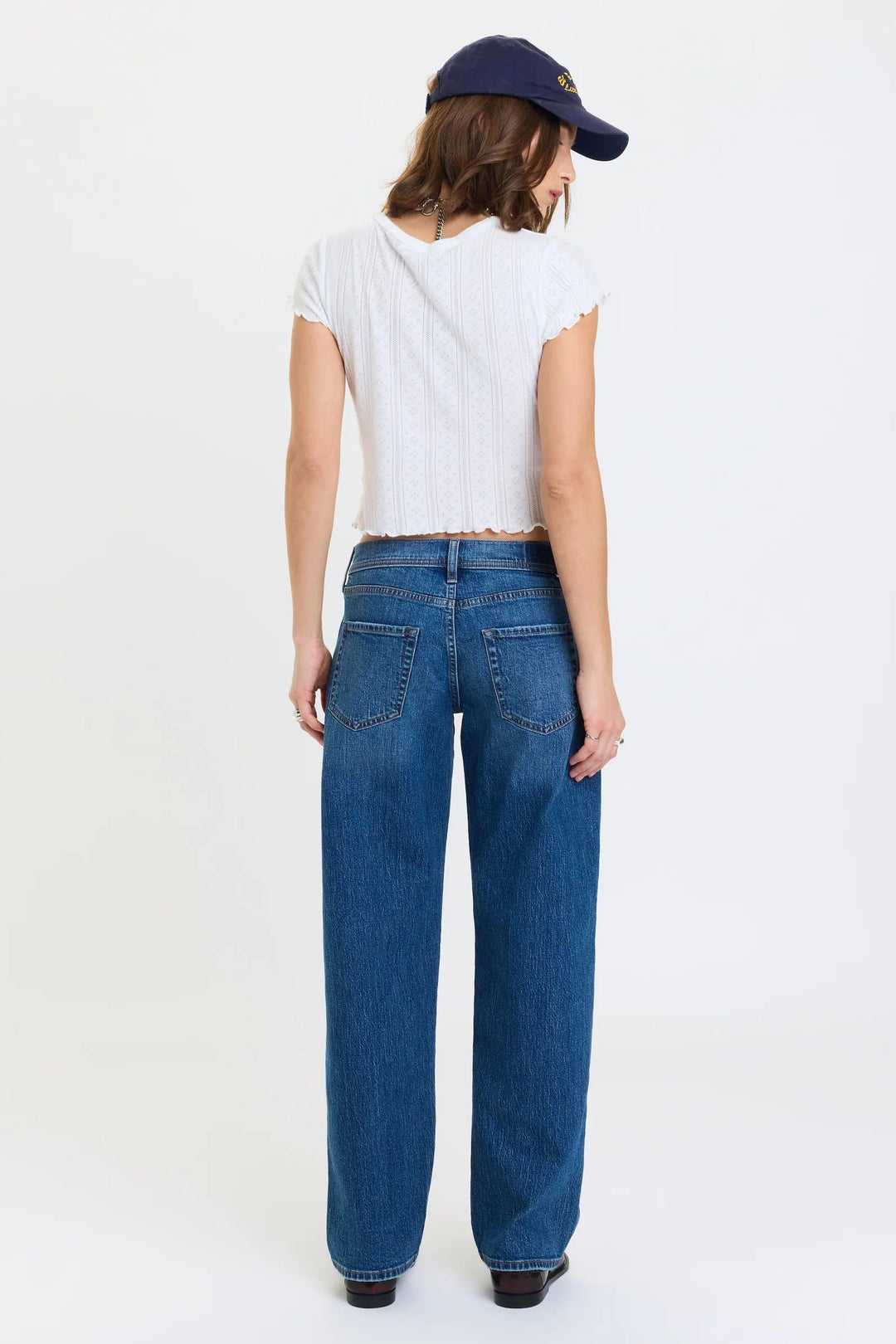 daze denim replay low rise v-waist barrel jeans in a medium wash with a white pointelle lettuce trim short sleeve t-shirt