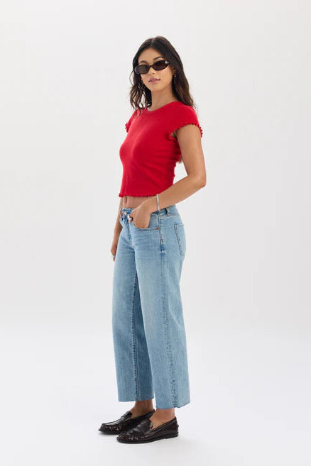 daze denim keeper low rise cropped straight jeans black loafers raw Hem light wash denim with a red top