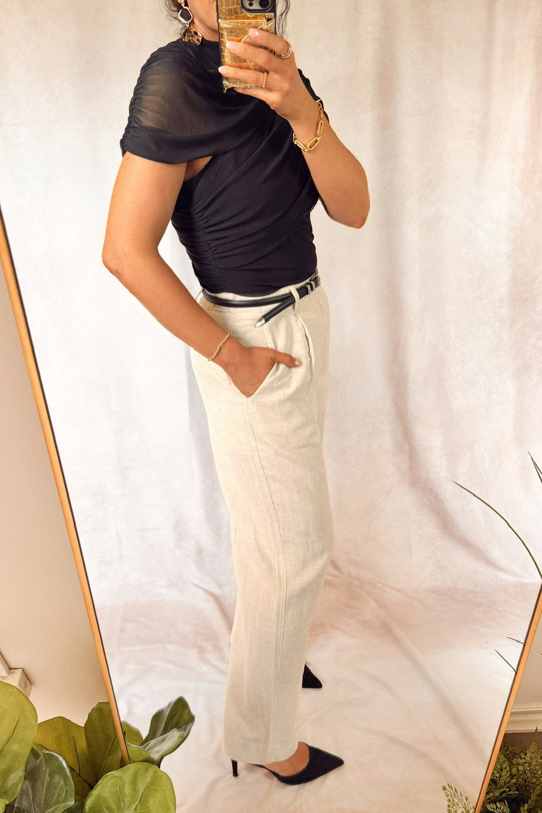 heartloom rumer pants natural beige with teve Madden layered ruch Kerry top black with black heels and a slim leather black belt 