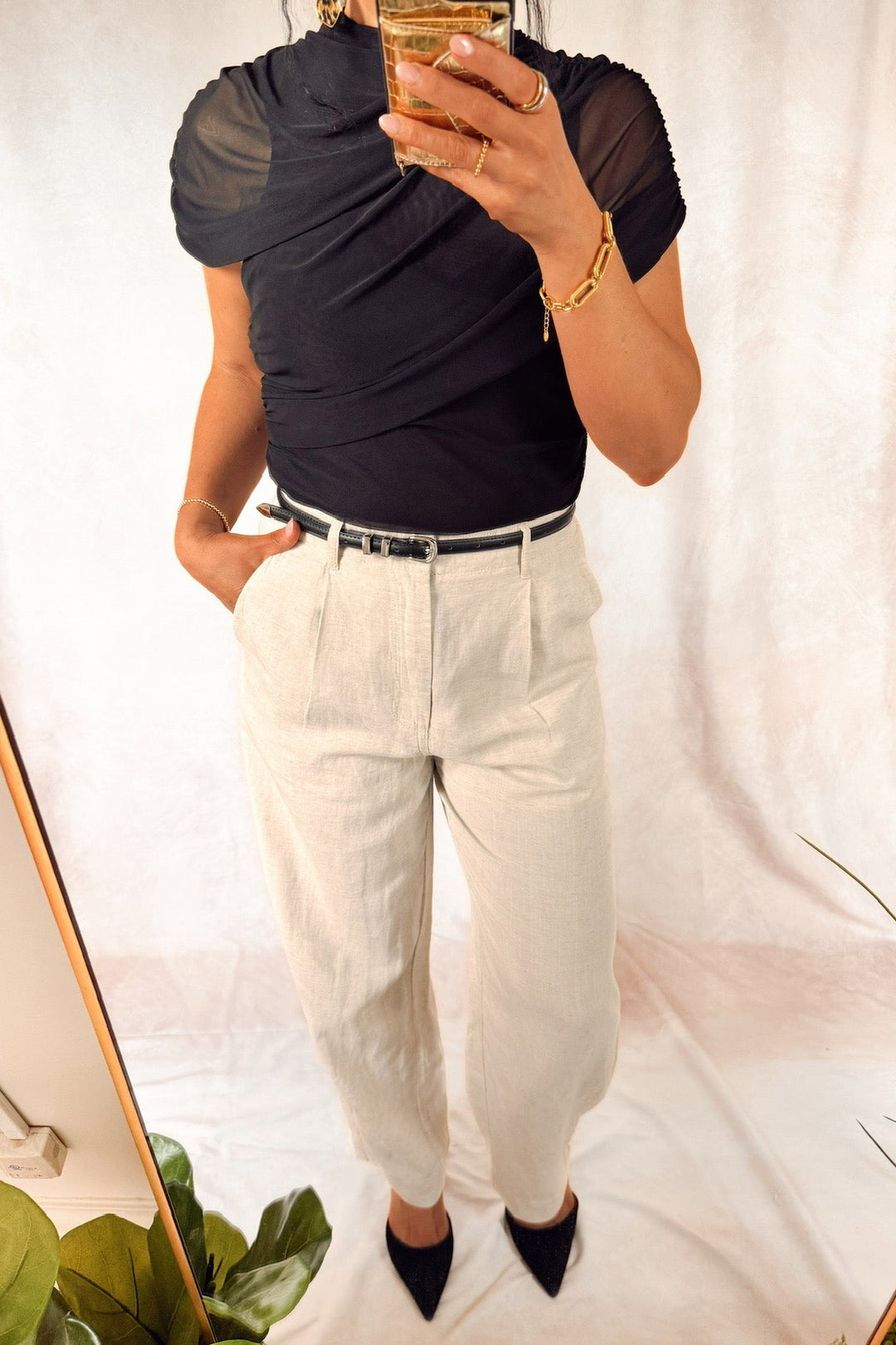 heartloom rumer pants natural beige with teve Madden layered ruch Kerry top black with black heels and a slim leather black belt 