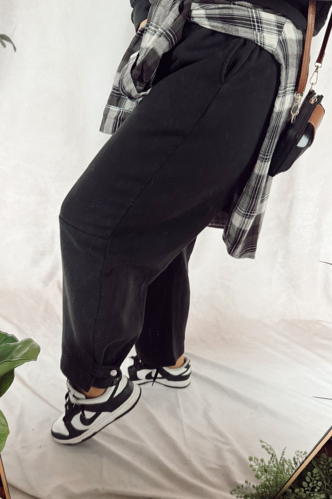 velvet heart matching sweat set Hancock pullover sweatshirt with Joshua sweatpants with a flannel tied around the waist and black and white Nike dunks