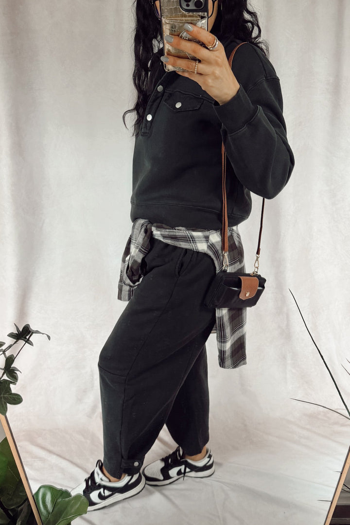velvet heart matching sweat set Hancock pullover sweatshirt with Joshua sweatpants with a flannel tied around the waist and black and white Nike dunks