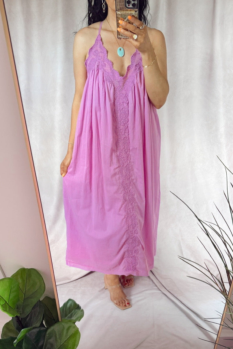 FRNCH rhode light purple maxi dress with lace trim and a tan straw handle bag