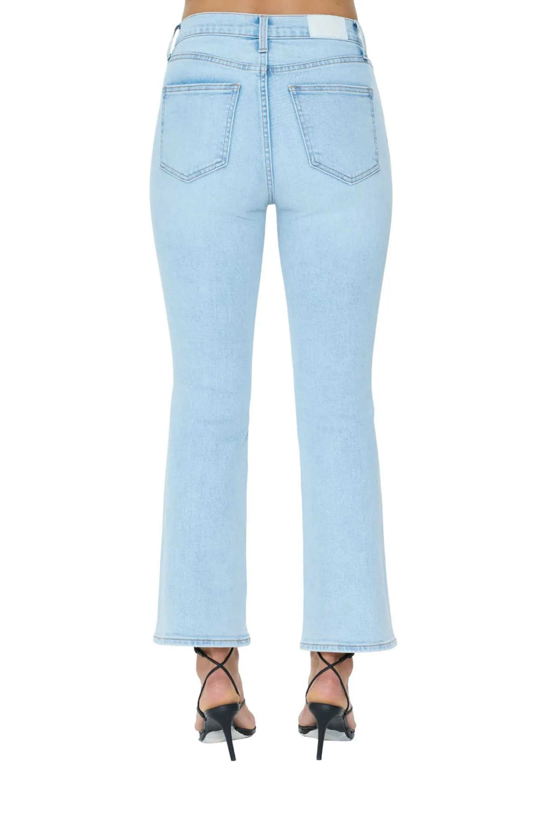 PISTOLA denim Lennon High Rise boot cut jeans in Cherish light wash with a short sleeve white tee shirt and black strappy heels 