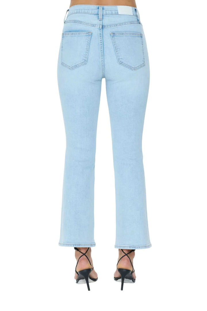 PISTOLA denim Lennon High Rise boot cut jeans in Cherish light wash with a short sleeve white tee shirt and black strappy heels 
