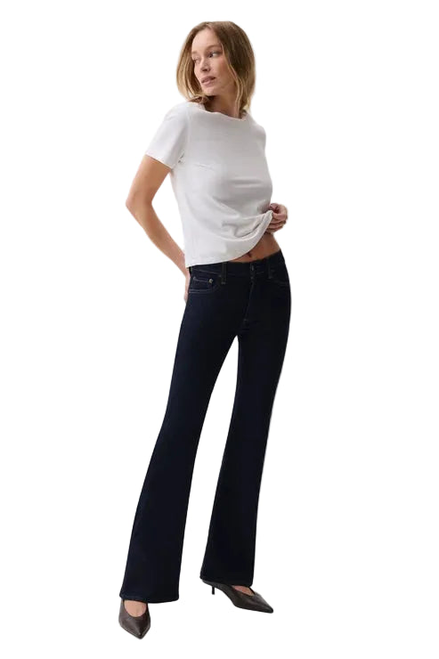 pistola denim Kinsley Mid Rise super stretchy dark Wash flare full length jean with a white tee and black pumps