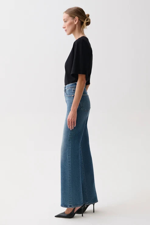 pistola denim Evie high Rise comfort stretch slim boot cut jeans medium wash with a black short sleeve top and black pumps