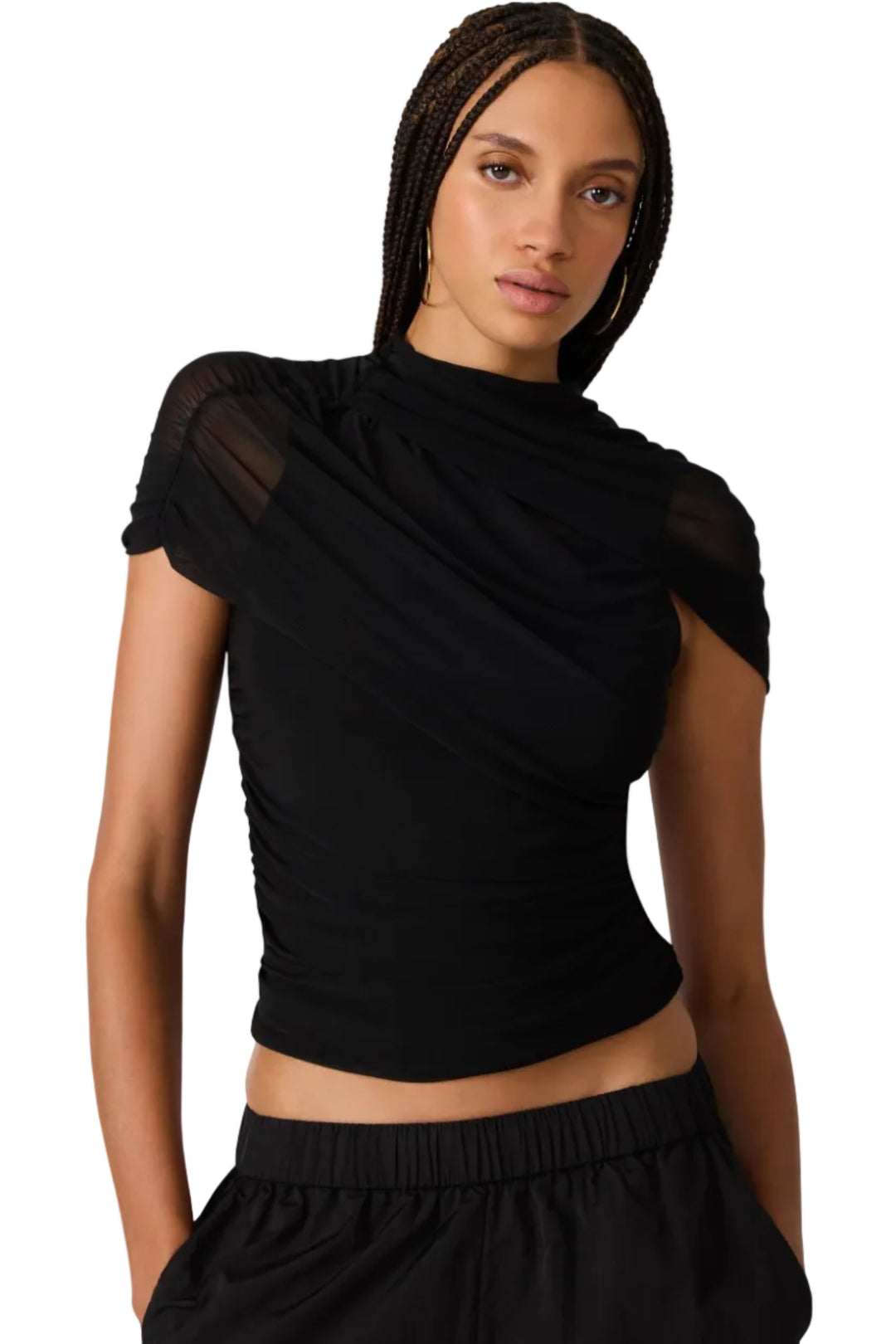  black short-sleeve top with sheer mesh ruching  and a ruched draped neckline, paired with black bottoms