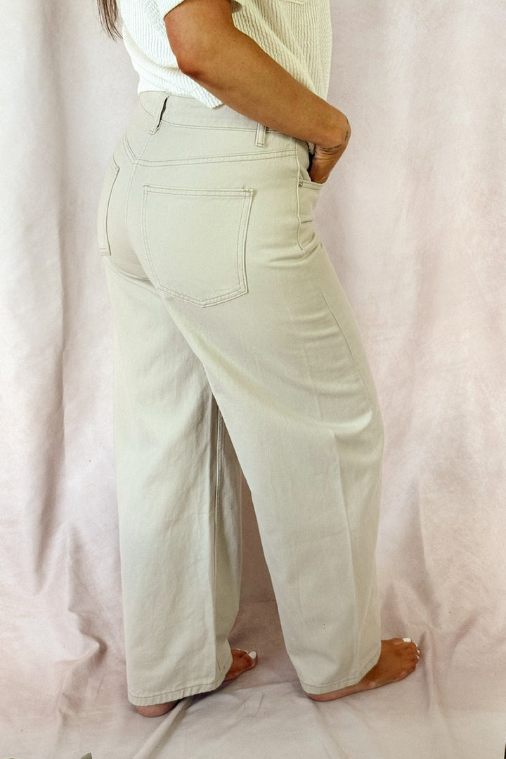 Stanton high rise barrel jeans greige stone with ivory short sleeve v-neck top
