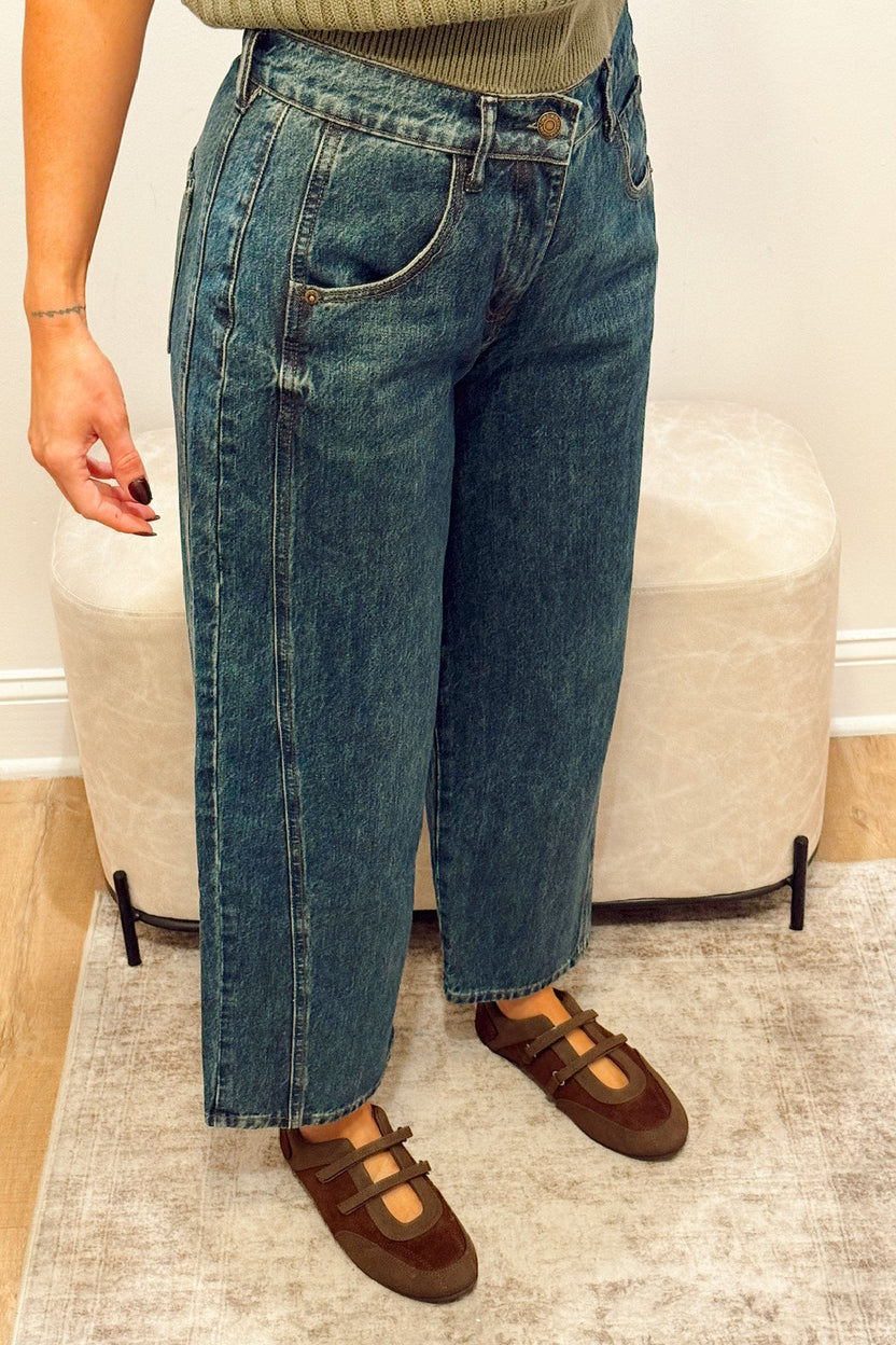 high rise dark wash wide leg barrel jeans slouchy with brown Mary Jane flats and a green ribbed short sleeve sweater