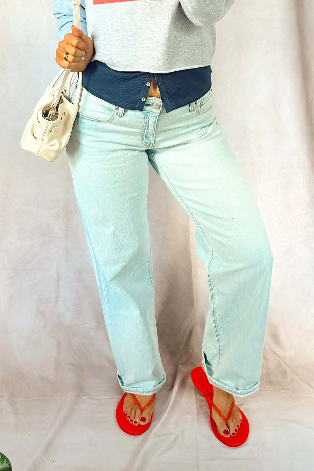 daze keeper low rise jeans with z supply navy ribbed button down tank top with red tkees and USA flag sweatshirt fourth of July looks outfits Americana summer