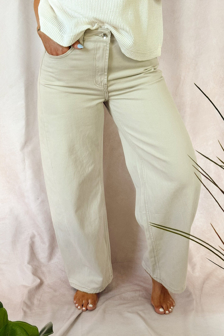 Stanton high rise barrel jeans greige stone with ivory short sleeve v-neck top