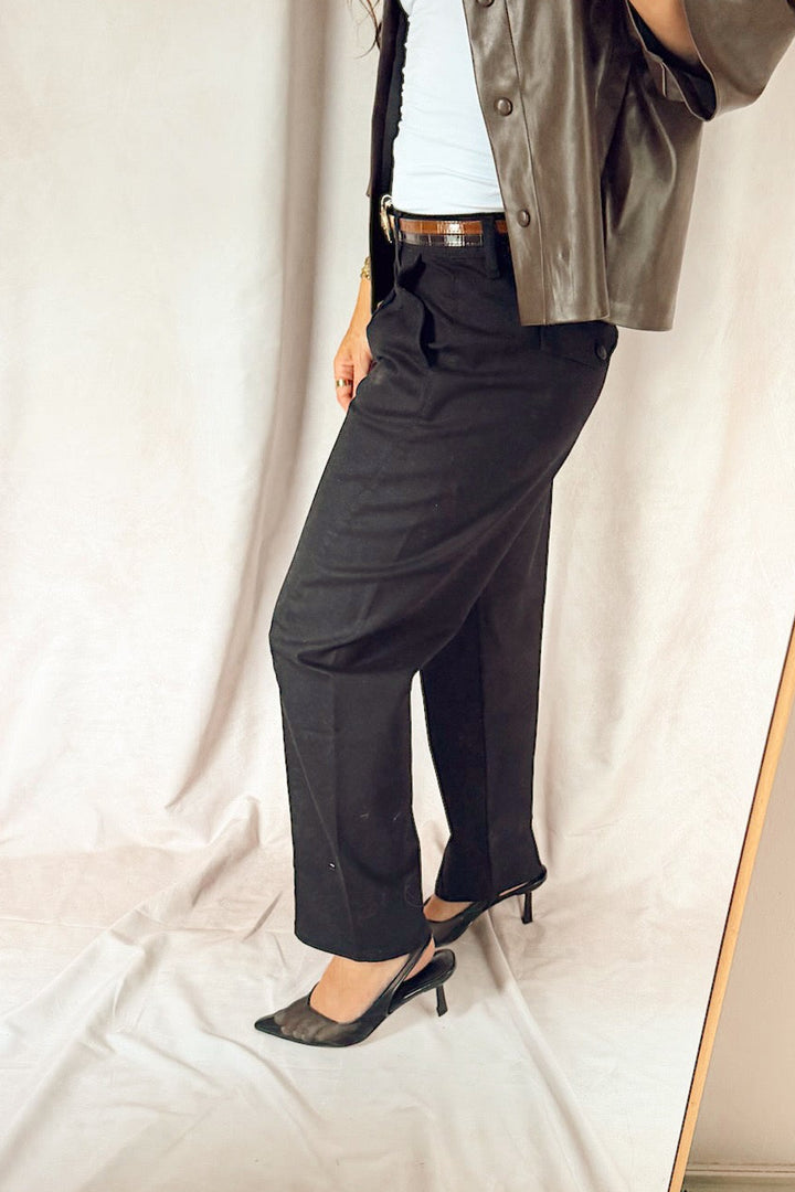 bevy Flog high rise pleated tapered trouser with a smooth white tank top and black heels and a two-tone leather croc glazed belt 