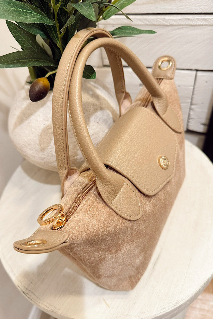 britney taupe faux suede cross body bag