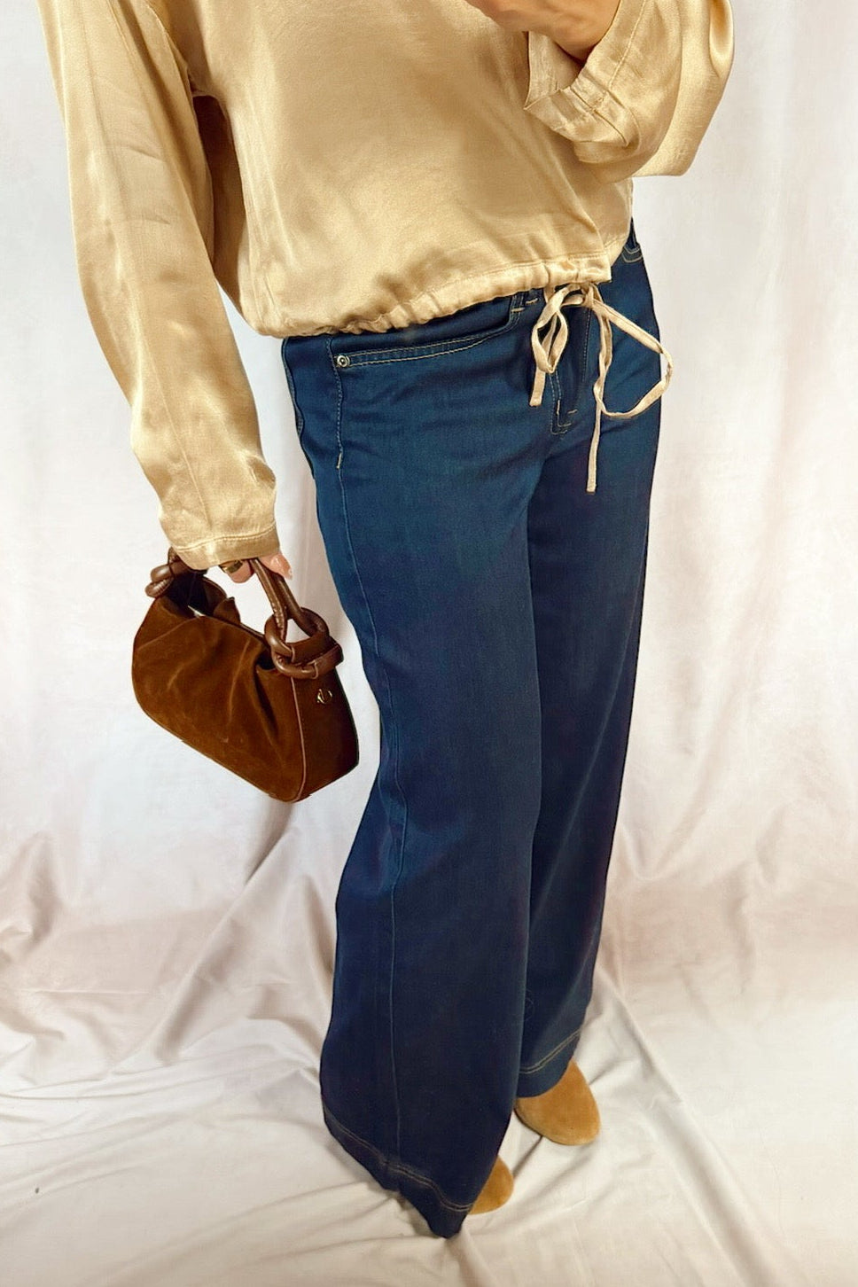 bevy flog Jodi wide leg dark denim jeans with velvet heart sadona blouse top gold shimmer and a faux suede brown mini bag
