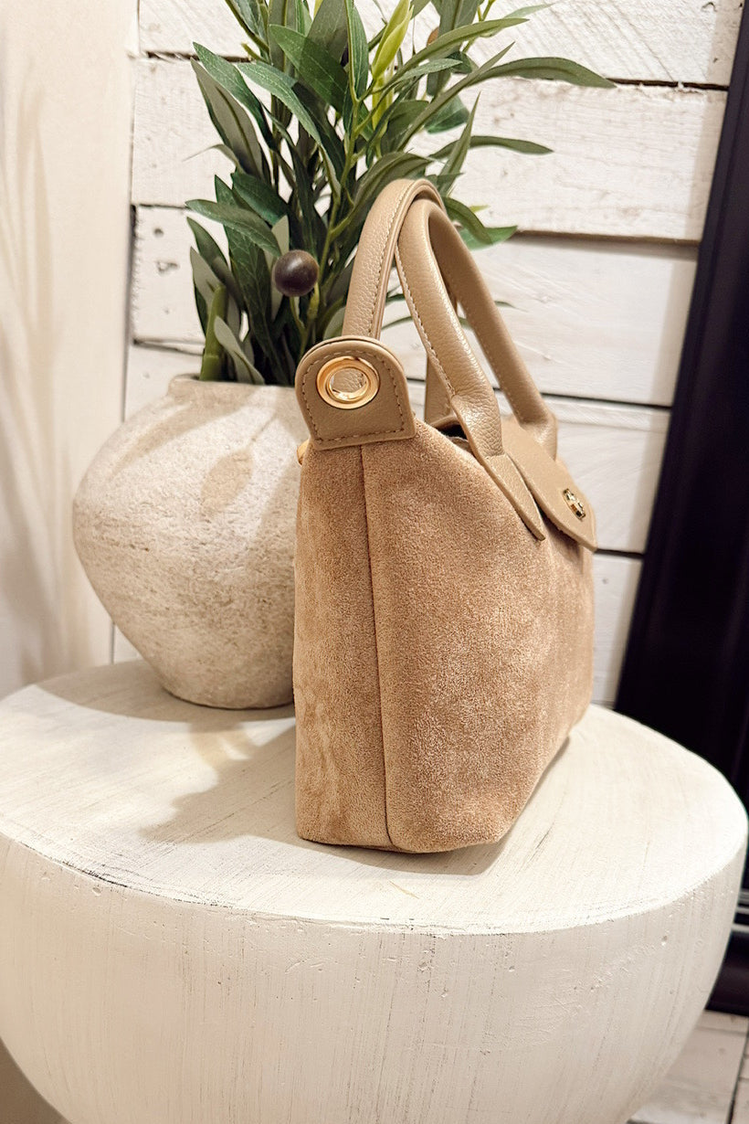 britney taupe faux suede cross body bag