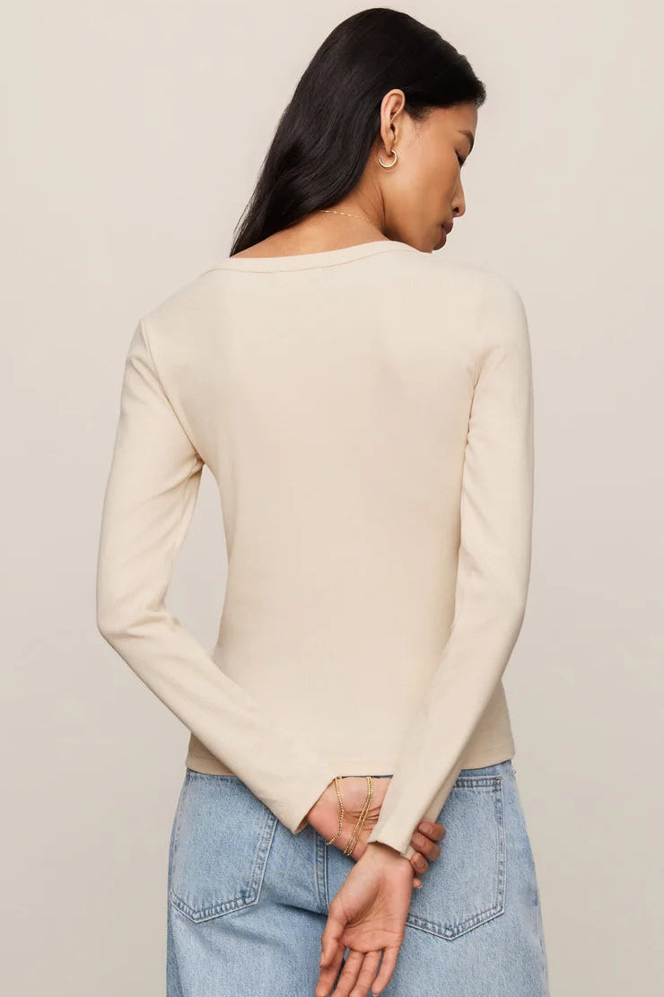 z supply Greyson Scoop neck long sleeve ribbed tea in chalk cream with light wash denim
