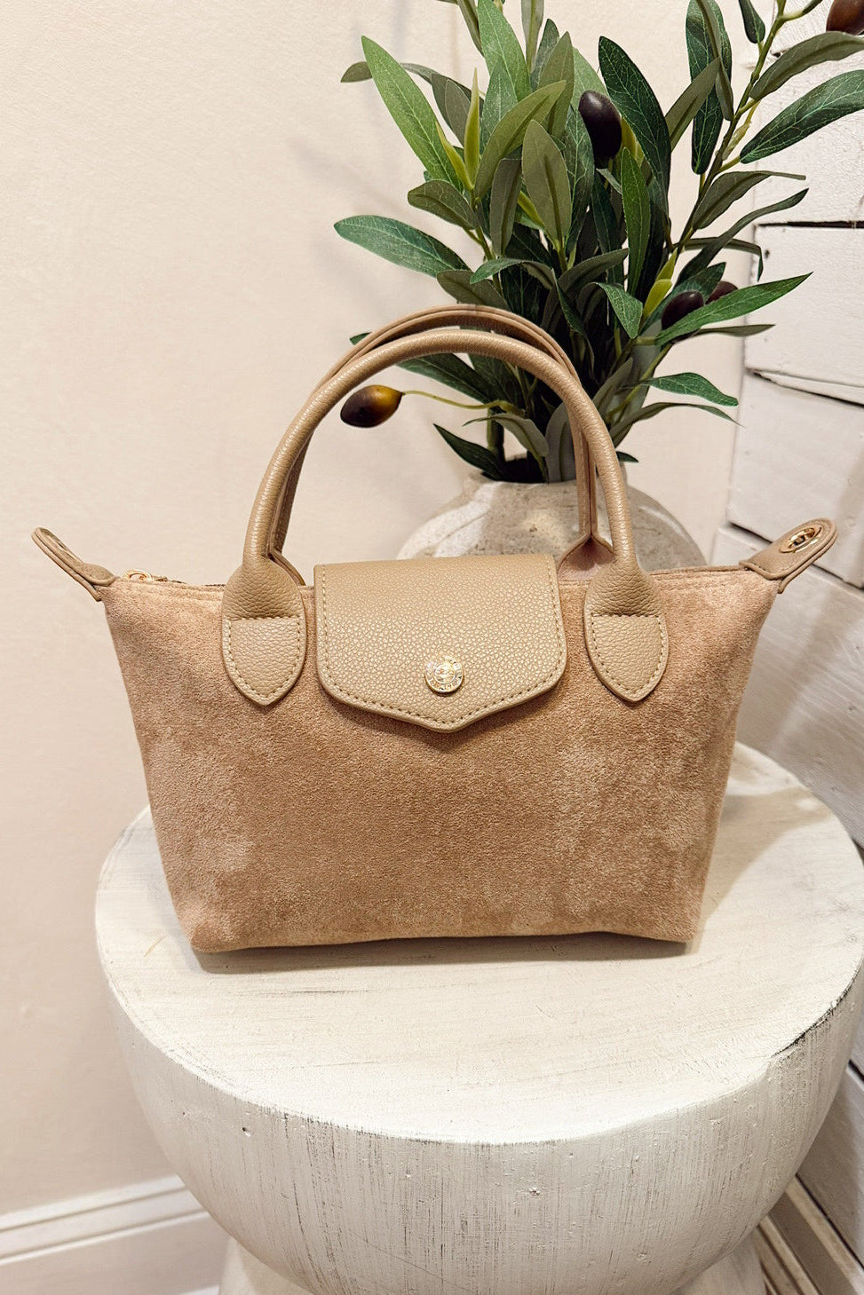 britney taupe faux suede cross body bag