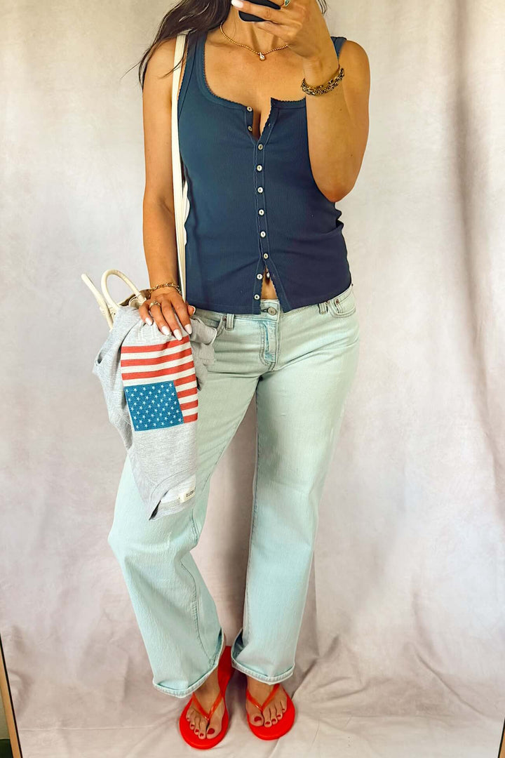 daze keeper low rise jeans with z supply navy ribbed button down tank top with red tkees and USA flag sweatshirt fourth of July looks outfits Americana summer