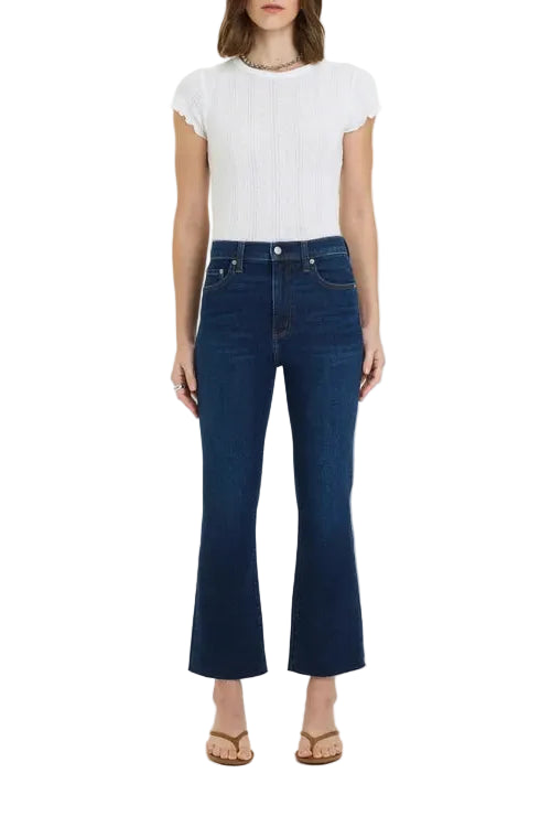 daze denim shy girl high rose crop flare jeans in a dark wash with a white short sleeve shirt and brown sandals