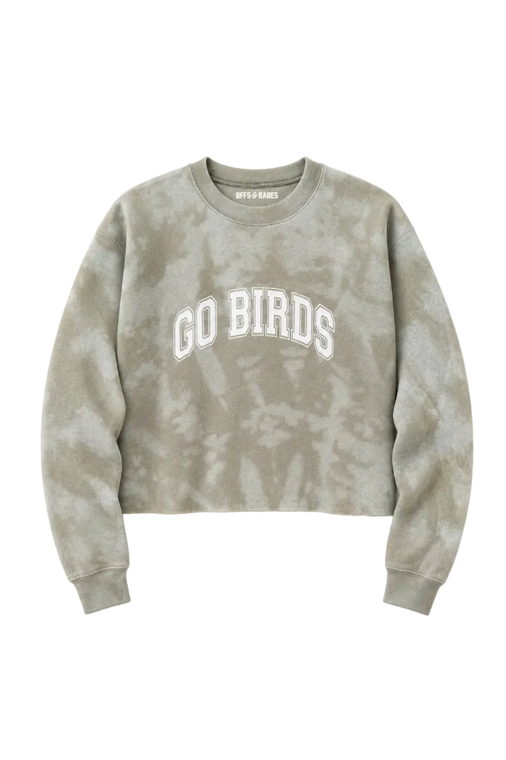 pullover sweatshirt in a light green, sage tie-dye color with "Go Birds" in White varsity lettering on the front