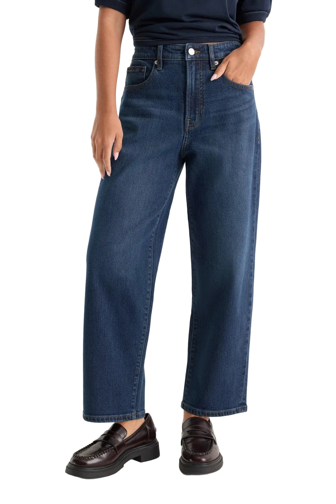 good American Vintage Barrel jeans dark wash with a dark top and brown loafers