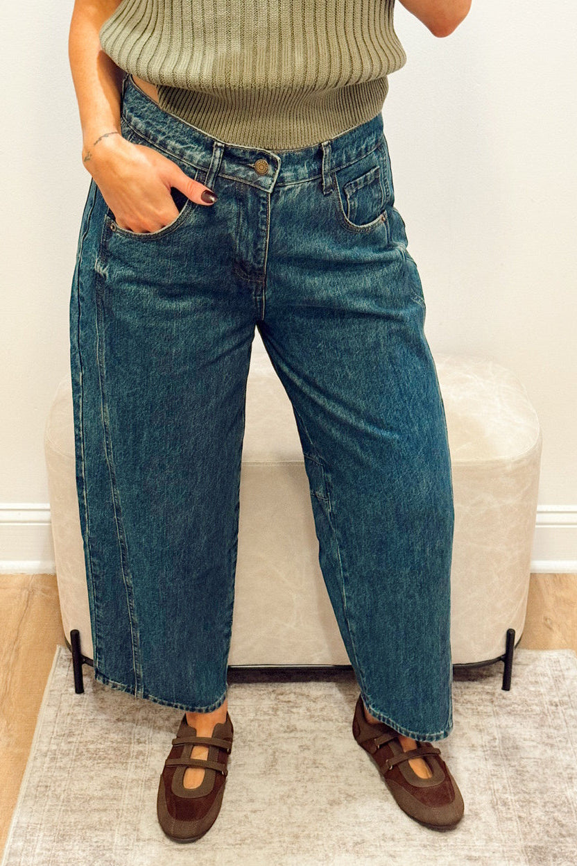 high rise dark wash wide leg barrel jeans slouchy with brown Mary Jane flats and a green ribbed short sleeve sweater