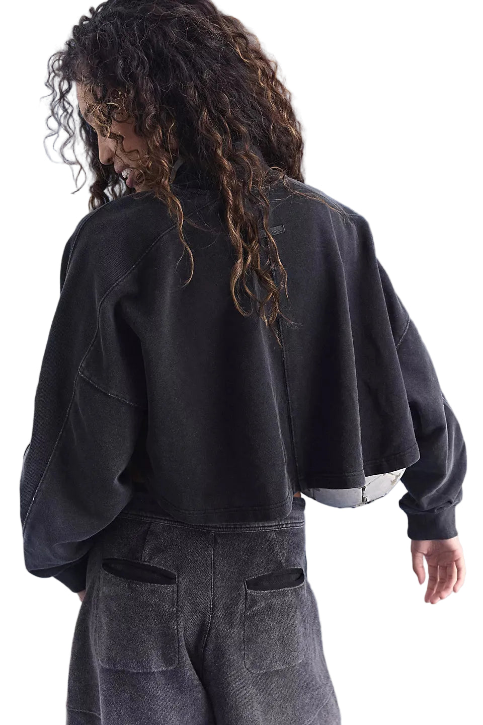free people FP movement pick up game mock neck pullover sweatshirt black layered over a white crop top with dark grey sweatpants