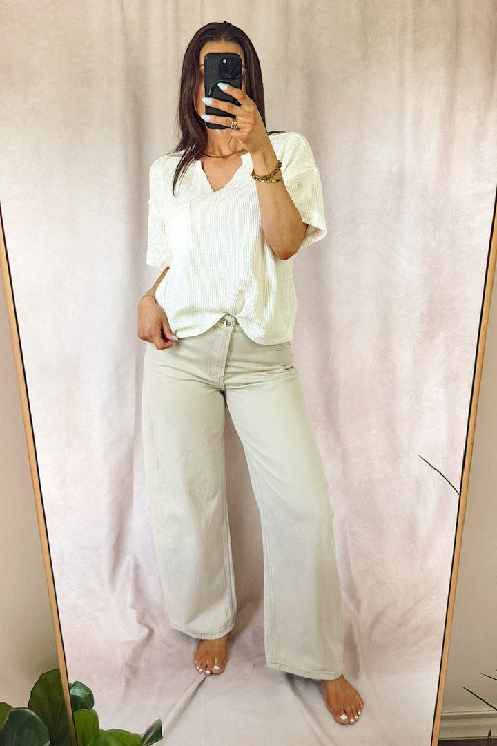Stanton high rise barrel jeans greige stone with ivory short sleeve v-neck top