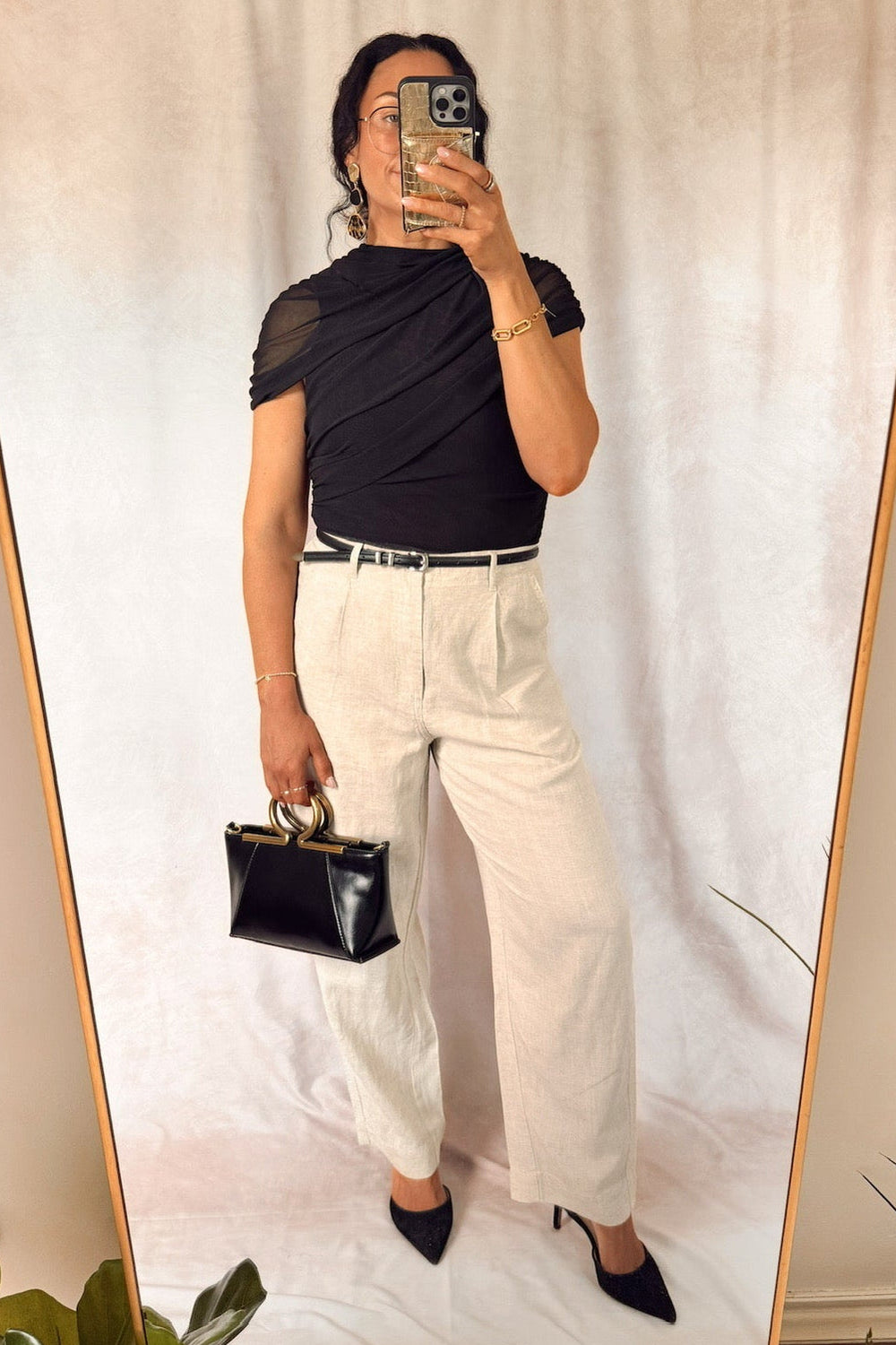 heartloom rumer pants natural beige with teve Madden layered ruch Kerry top black with black heels and a slim leather black belt 