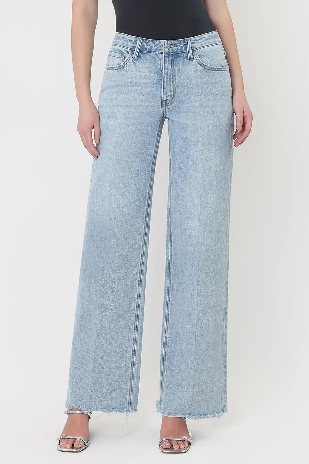 vervet Olivia High rise wide leg trouser crease seam frayed raw hem with black tank and silver strappy kitten heel sandals