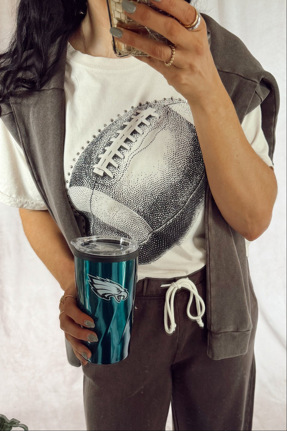 rhinestone Football Tee black graphic on a cream short sleeve t-shirt with z supply sweatpants