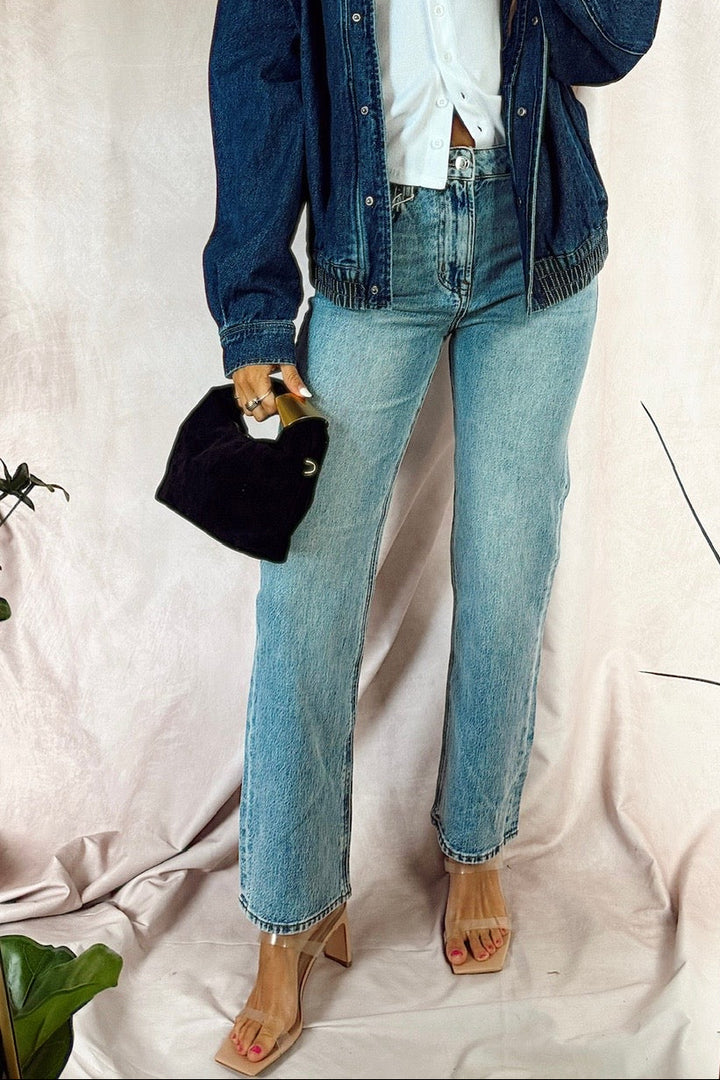 z Supply the Muse High Rise straight leg denim jean light Year wash with chaser brandy White button up long sleeve shirt and daze denim phantom dark wash jean jacket with a funnel neck paired with nude heels and a black faux suede bag